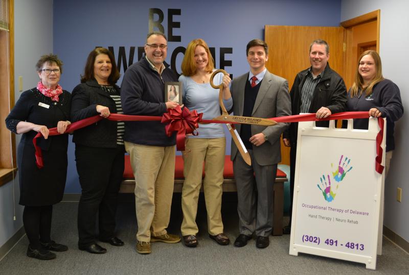 Shown are (l-r) CCGM Secretary Alicia Hollis, CCGM President Terri Favata, owners Mark and Tracy Dissinger holding a photo of their daughter who is away at college but with them in spirit, Milford Mayor Bryan Shupe, CCGM ambassador Andy Stevens and Occupational Therapy of Delaware office administrator Christy Baker. SOURCE SUBMITTED